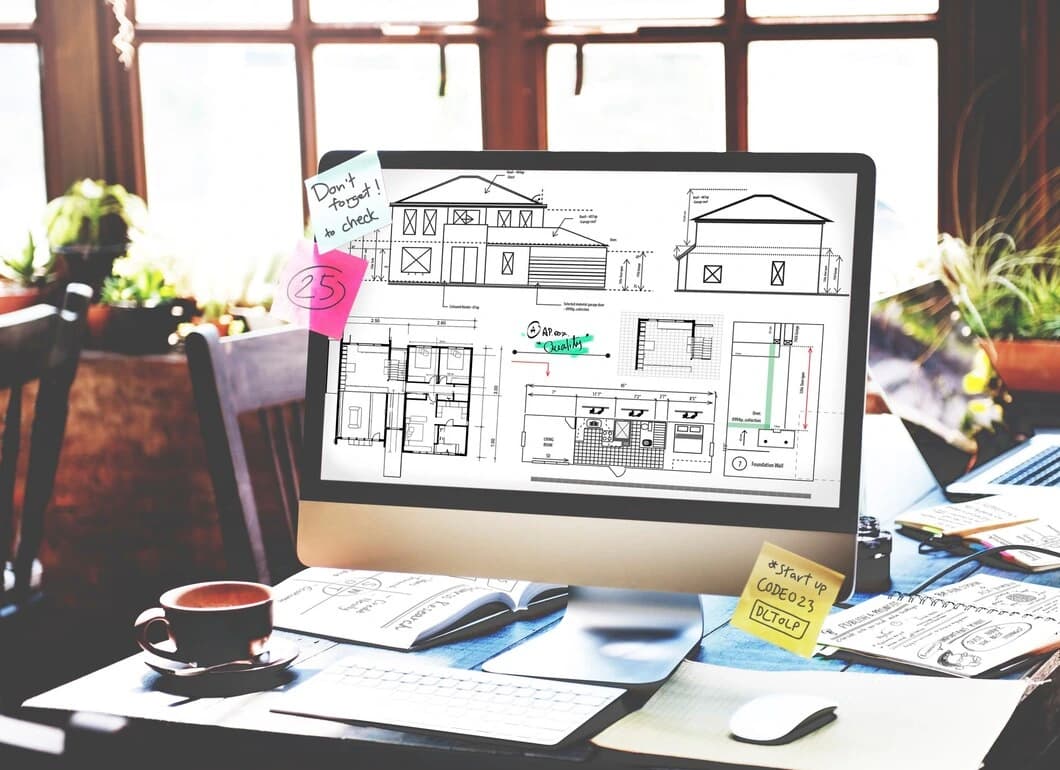 Multi-story construction site with crane — Grace Estimating customer services